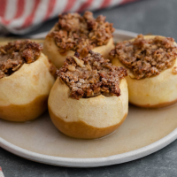 Baked Apples with Granola Recipe | EatingWell image
