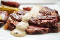 Grilled Ribeye Steak with Green Peppercorn Sauce | CLEO TV image