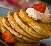 Strawberry Pancakes | BBC Good Food image