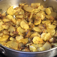 Steve's Famous Garlic Home Fries Recipe | Allrecipes image