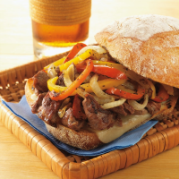 Philly-Style Steak Sandwiches with Grilled Onions and ... image