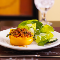Stuffed Yellow Peppers Recipe | EatingWell image