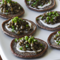 Beluga Lentil Caviar on Blini Recipe | Epicurious image