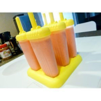 Bolis de rompope (Mexican Eggnog Popsicles) - Just A Pinch image
