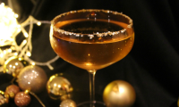 The Golden Bauble Cocktail with Prosecco, Amaretto, and ... image
