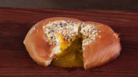 Everything Egg in a Bagel Hole Recipe | MyRecipes image