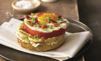 Bacon, Egg, Cheese, and Squash on a Bagel Recipe | MyRecipes image