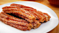 Churros Filled with Dulce de Leche Recipe - Tablespoon.com image
