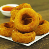 Cheesy Onion Rings | So Delicious image