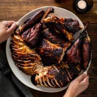 Rodney Scott's Holiday Smoked Turkey | Cook's Country image