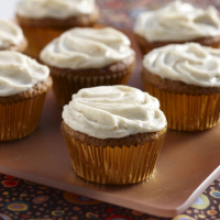 Harvest Pumpkin Cupcakes Recipe | MyRecipes image