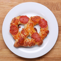 Cheese-stuffed Pizza Pretzels Recipe by Tasty image