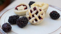 Mini Blackberry-Raspberry Pies Recipe - Pillsbury.com image