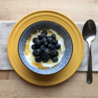 Yogurt with Blueberries & Honey Recipe | EatingWell image