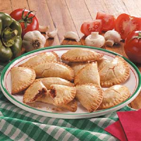 Pizza Turnovers Recipe: How to Make It - Taste of Home image