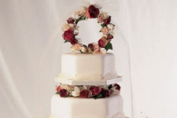 Garlands and tulle wedding cake Recipe | Good Food image