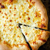 Pizza Dough Recipe - The Best Pizza Crust | Punchfork image