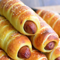 Wrapped Up Hot Dog Recipes That Go Beyond Pigs in a Blanket image