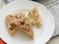 ALMOND TRIANGLES | Just A Pinch Recipes image