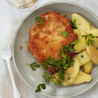 Pork Schnitzel with Warm Potato Salad Recipe - Food & Wine image