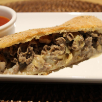 Cheesesteak Stromboli Recipe | Allrecipes image