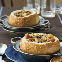 Toasted Bread Bowls Recipe | MyRecipes image