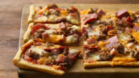 Mega-Meat Pizza Recipe - Pillsbury.com image