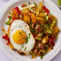 Potato Hash with Sausage & Fried Egg Recipe | EatingWell image