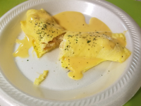 Seafood Omelets with Creamy Cheese Sauce Recipe | Allrecipes image