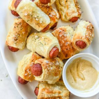Pigs In a Puff Pastry Blanket | Just A Pinch Recipes image
