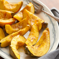 Cheese-Topped Acorn Squash Recipe | EatingWell image