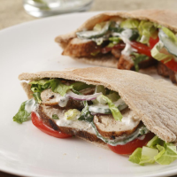Indian-Spiced Chicken Pitas Recipe | EatingWell image