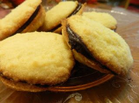 Banana Chocolate Cream Sandwich Cookie | Just A Pinch Recipes image