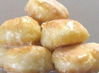 Homemade Krispy Kremes Donut Holes - Just A Pinch Recipes image