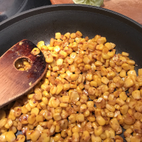 Fire-Roasted Corn in a Skillet | Just A Pinch Recipes image