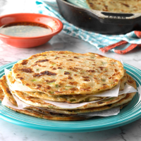 Chinese Scallion Pancakes Recipe: How to Make It - Taste of Home: Find Recipes, Appetizers, Desserts, Holiday Recipes & Healthy Cooking Tips image