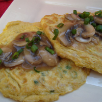 Egg Foo Yung with Mushroom Sauce Recipe | Allrecipes image