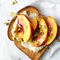 Pistachio & Peach Toast Recipe | EatingWell image