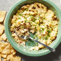 Baked Feta & Artichoke Dip Recipe | EatingWell image