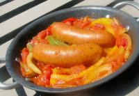 Chorizos a la pomarola | Just A Pinch Recipes image