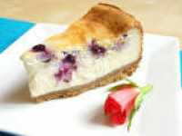 Eggless Blueberry and White Chocolate Baked Cheesecake by ... image