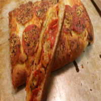 Braided Pizza Roll Recipe | Allrecipes image