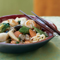 Braised Seafood and Vegetable Noodles Recipe | MyRecipes image