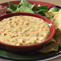 Southwestern Chicken Queso Dip | Ready Set Eat image