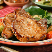 Golden Juicy Pan Fried Pork Chops | Maven Cookery image