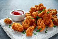 Parmesan Chicken Nuggets | TastyCookery image