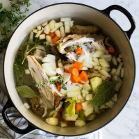 Homemade Roasted Chicken Stock Recipe | EatingWell image