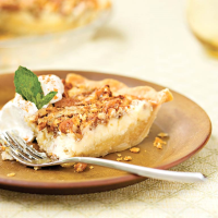 Pecan Cheesecake Pie Recipe | MyRecipes image