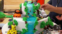 Buddy Valastro's Animal Safari Cake | Recipe - Rachael Ray ... image