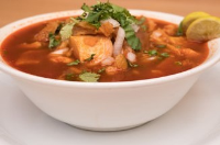 Menudo with Pig's Feet | Just A Pinch Recipes image